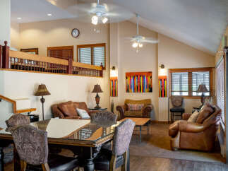 Step into luxury with this stunning property, featuring a spacious living area perfect for entertaining.