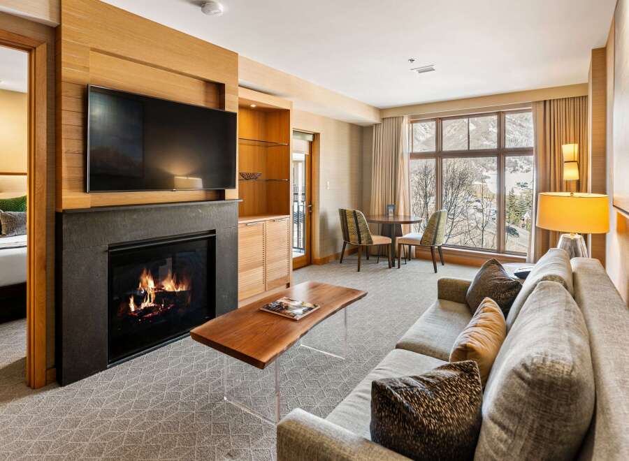 Experience luxury living in this stunning property featuring a cozy fireplace, perfect for relaxing evenings.