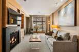 Experience luxury living in this stunning property featuring a cozy fireplace, perfect for chilly evenings.