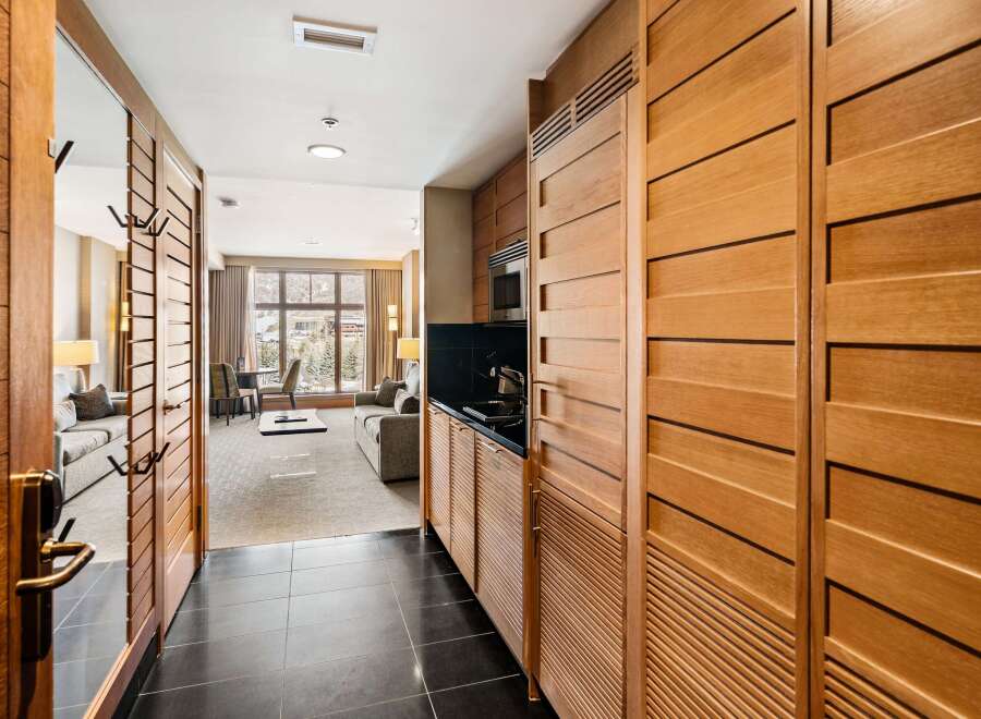 Step into luxury with this stunning property featuring exquisite wooden accents and a modern design.