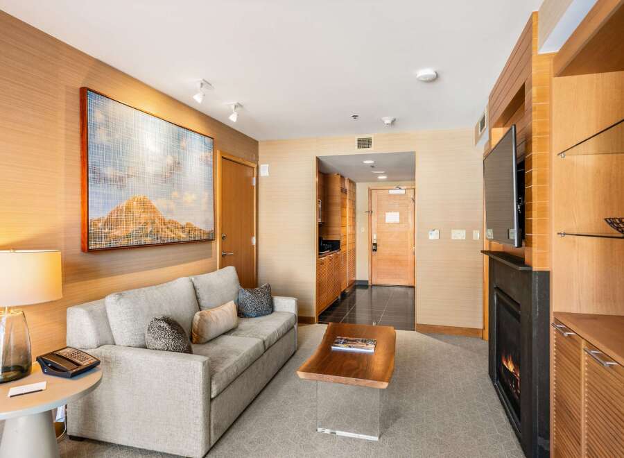 This stunning living space features a cozy fireplace, perfect for relaxing evenings.