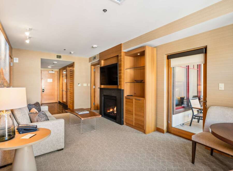 Experience luxury living in this stunning property featuring a cozy fireplace, perfect for relaxing evenings.