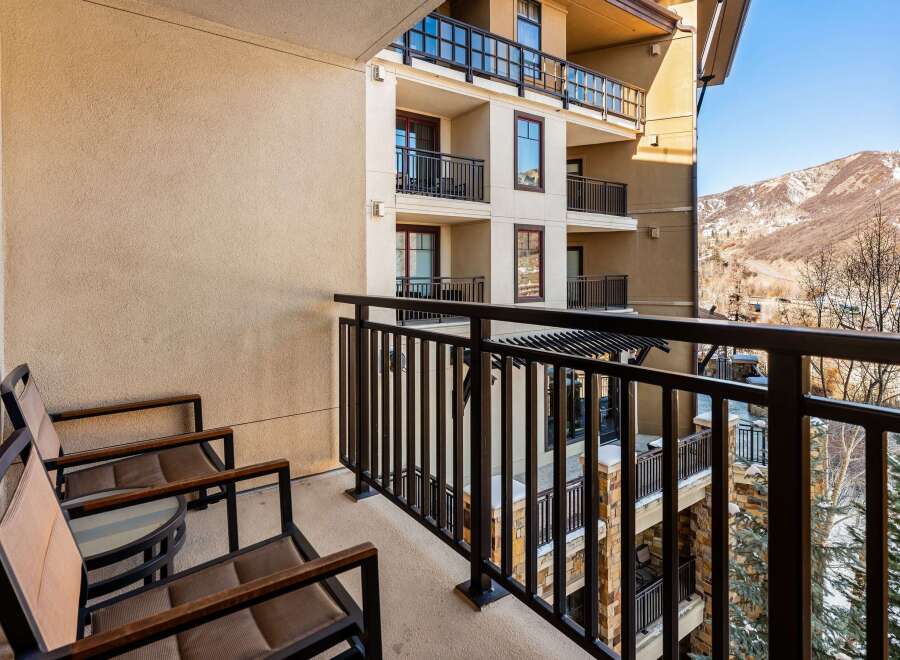 Enjoy breathtaking mountain views from this stunning balcony.