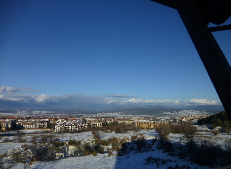 Snow-capped mountain views and a sprawling landscape are visible from this property.