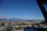 Snow-capped mountain views and a sprawling landscape are visible from this property.