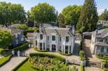 Discover luxury living in this stunning estate! This property boasts a grand facade, elegant design, and meticulously landscaped gardens.