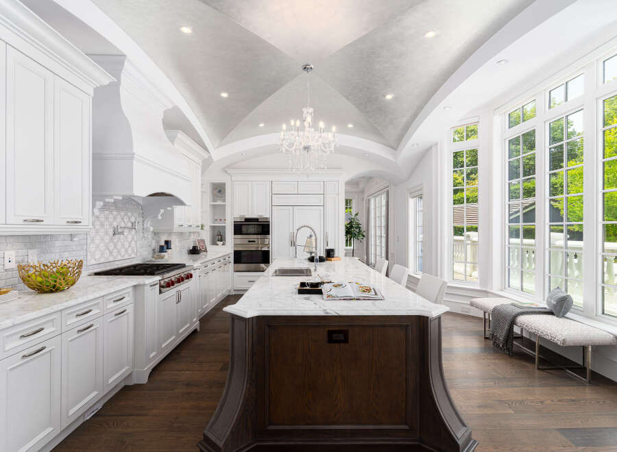 This stunning kitchen boasts a luxurious design with high-end finishes.