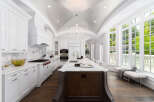 This stunning kitchen boasts a luxurious design with high-end finishes.