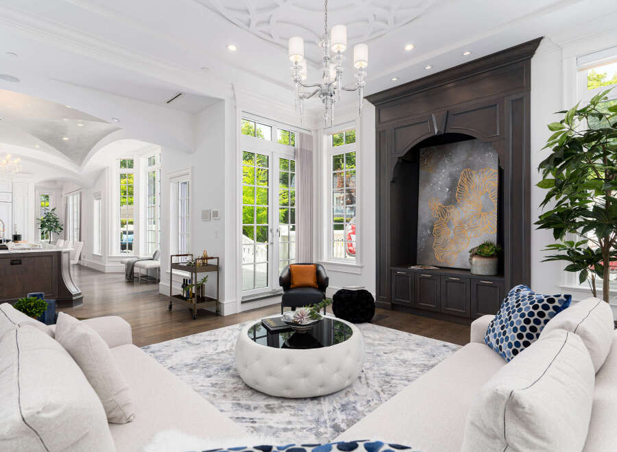 Experience luxury living in this stunning property, featuring a spacious living room with exquisite design.