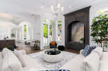 Experience luxury living in this stunning property, featuring a spacious living room with exquisite design.
