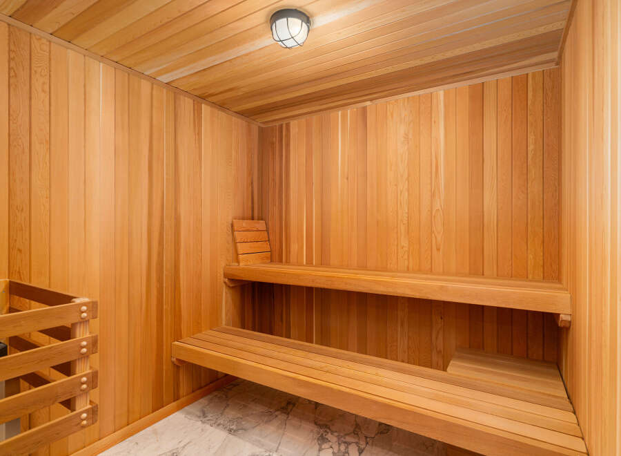 Step into relaxation with this stunning sauna, a perfect addition to any luxury home.