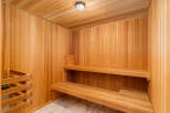 Step into relaxation with this stunning sauna, a perfect addition to any luxury home.
