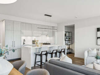 Experience modern living in this stunning kitchen! Featuring sleek cabinetry, a spacious island with seating, and high-end appliances, this kitchen is perfect for both cooking and entertaining.
