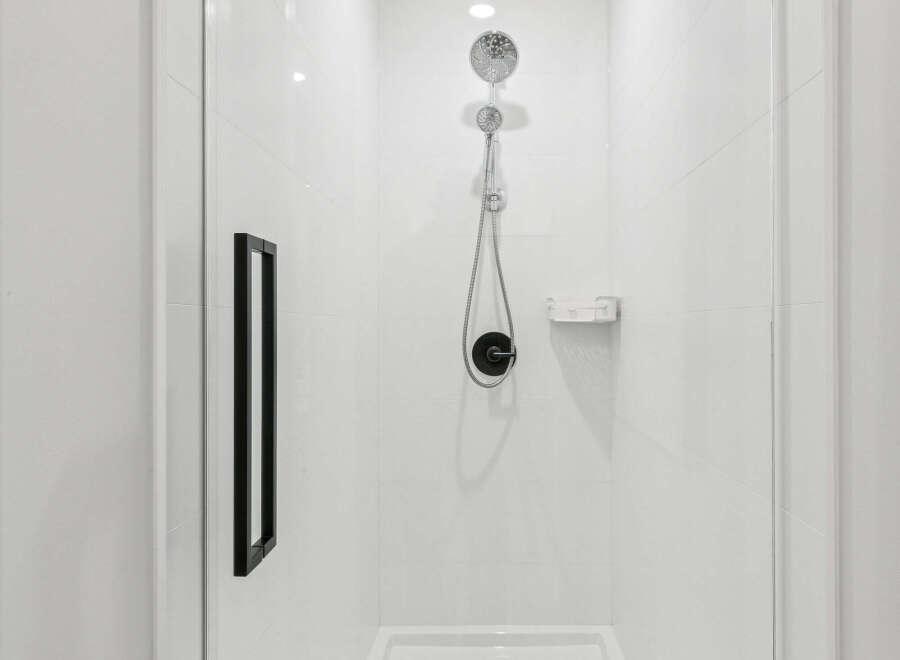 Step into a modern oasis with this sleek shower.