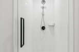 Step into a modern oasis with this sleek shower.