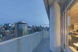Enjoy stunning city views from this modern balcony.