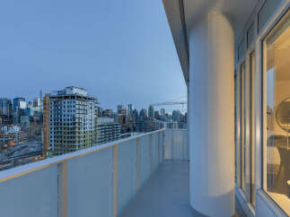 Enjoy stunning city views from this modern balcony.