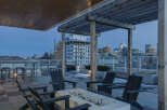 Enjoy breathtaking city views from this stunning rooftop patio.
