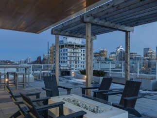 Enjoy breathtaking city views from this stunning rooftop patio.