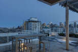 Enjoy stunning city views from this luxurious rooftop patio.