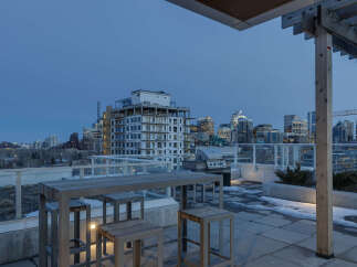 Enjoy stunning city views from this luxurious rooftop patio.