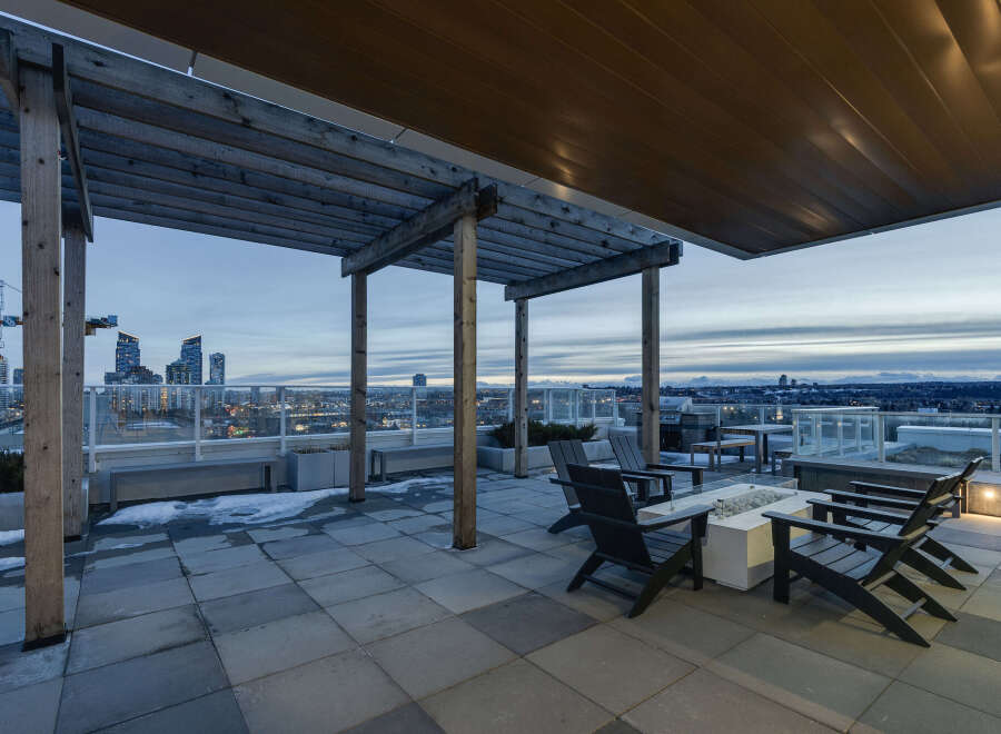 Enjoy breathtaking city views from this stunning rooftop patio.