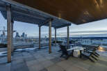 Enjoy breathtaking city views from this stunning rooftop patio.
