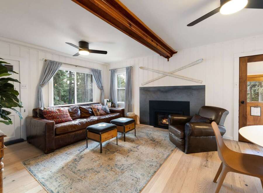 Step into a cozy living space with a rustic charm.