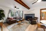 Step into a cozy living space with a rustic charm.
