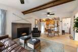 Step into a cozy living space featuring a stunning fireplace, perfect for those chilly evenings.