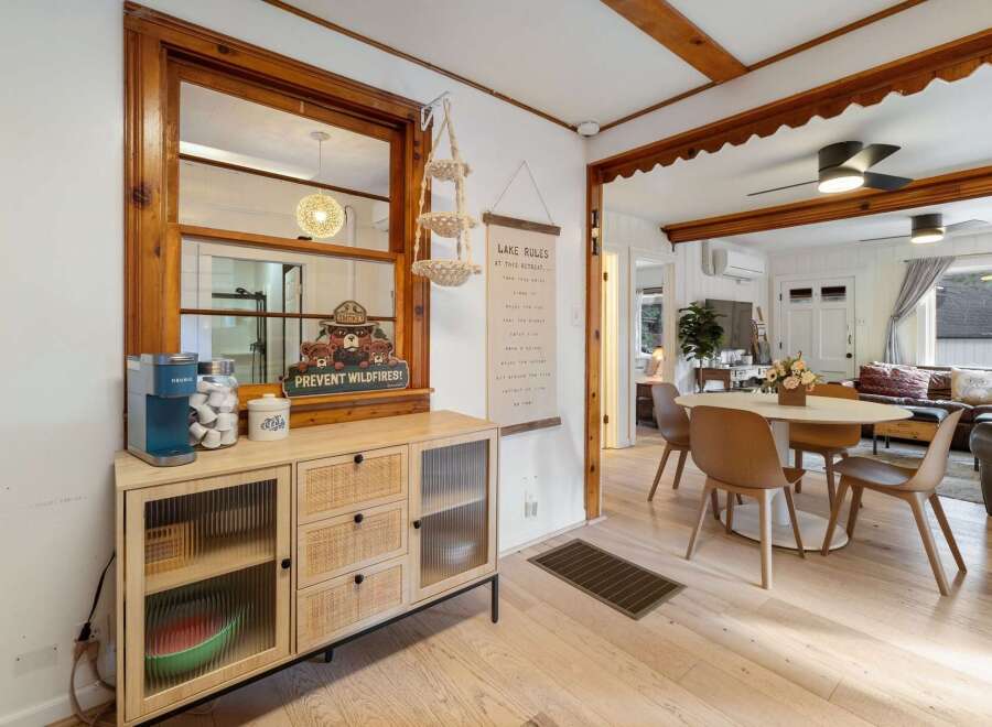Step into this charming retreat and discover a space designed for relaxation and enjoyment.