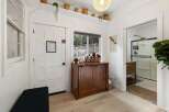 Step into this inviting space, featuring a blend of natural light and stylish design.