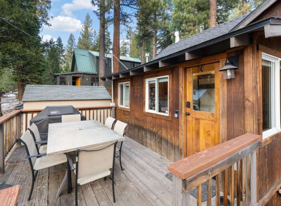Enjoy the tranquility of this charming cabin nestled in a serene wooded setting.