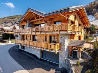 Discover the charm of this stunning wooden chalet, perfectly blending rustic aesthetics with modern comfort.