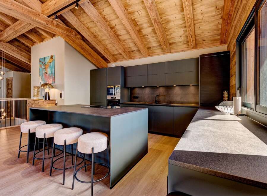 Experience luxury living in this stunning kitchen! Featuring a modern design with sleek cabinetry, a large island, and high-end appliances, this space is perfect for both cooking and entertaining.