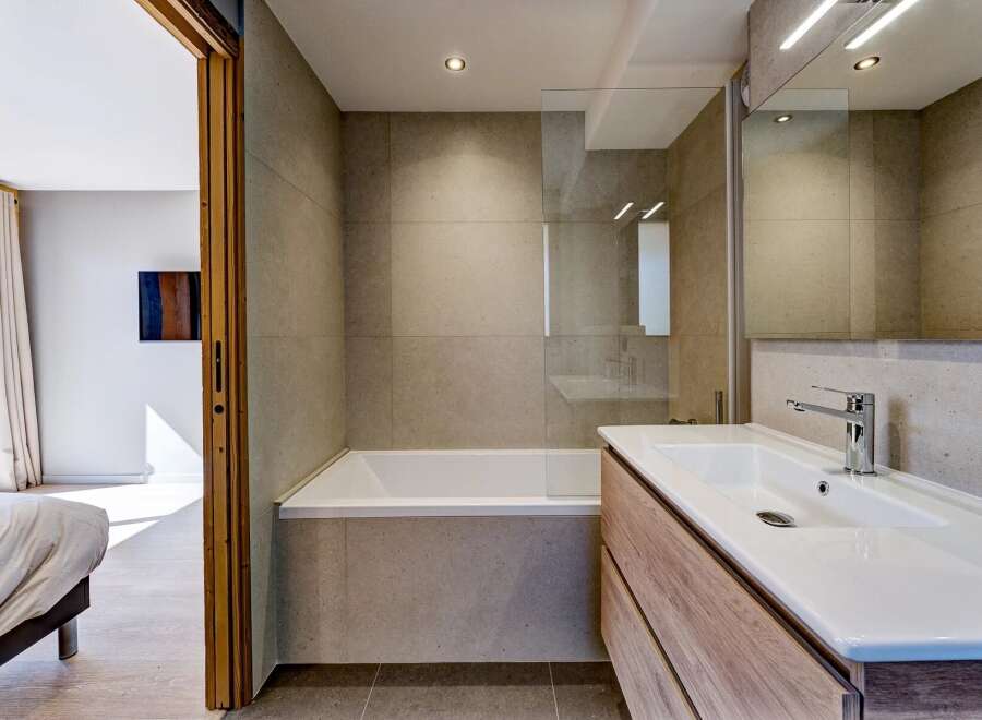 Step into a modern bathroom oasis.