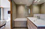 Step into a modern bathroom oasis.