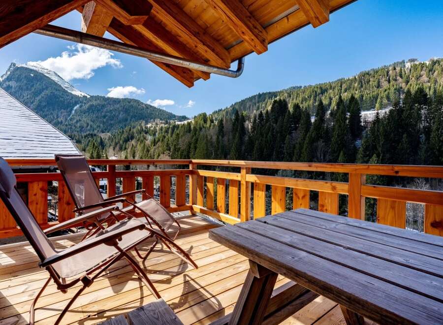 Enjoy breathtaking mountain views from this stunning balcony.