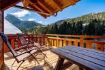 Enjoy breathtaking mountain views from this stunning balcony.