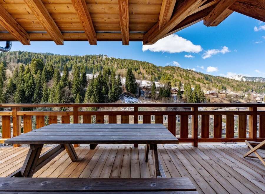 Enjoy breathtaking mountain views from this charming property.