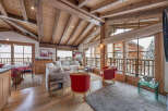 Experience the epitome of luxury living in this stunning chalet, boasting a warm and inviting interior.