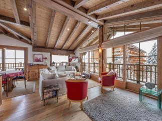 Experience the epitome of luxury living in this stunning chalet, boasting a warm and inviting interior.