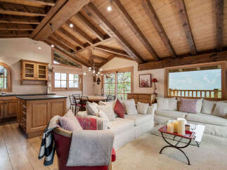 Experience rustic charm and modern comfort in this stunning mountain retreat.