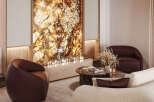 Experience luxury living in this stunning property, featuring a unique fireplace and a cozy seating area.