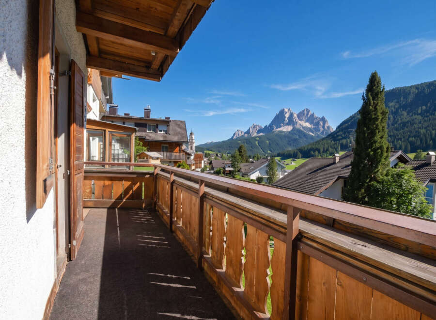 Enjoy breathtaking mountain views from this charming balcony, perfect for your morning coffee or evening relaxation.