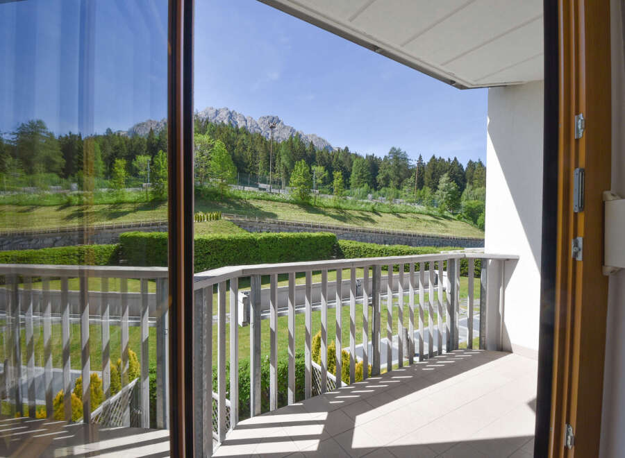 Enjoy breathtaking mountain views from this stunning balcony, perfect for your morning coffee or evening relaxation.