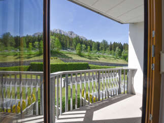 Enjoy breathtaking mountain views from this stunning balcony, perfect for your morning coffee or evening relaxation.