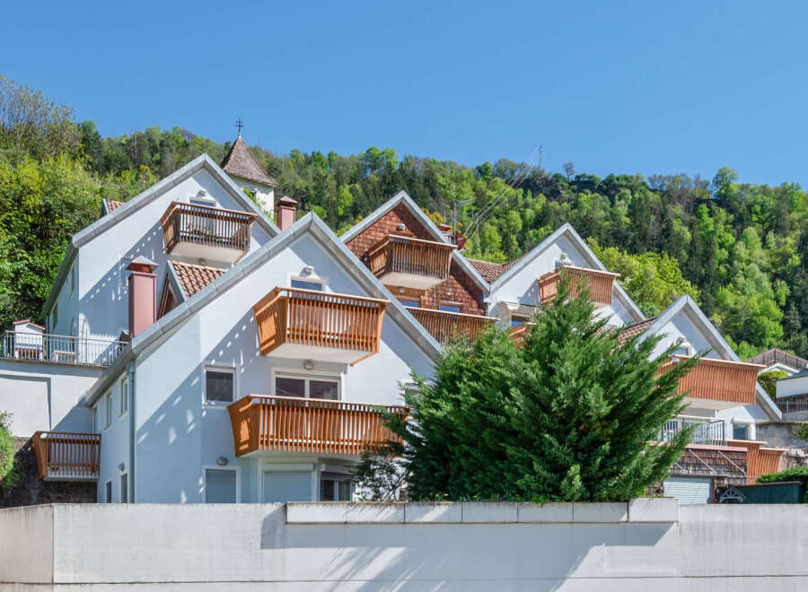 Discover this charming property featuring multiple units, each with its own balcony offering stunning views.