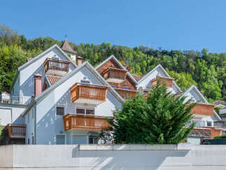 Discover this charming property featuring multiple units, each with its own balcony offering stunning views.