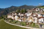 Discover charming alpine living in this picturesque village nestled amidst breathtaking mountain scenery.